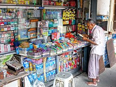 Elderly man at Singapore shop