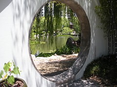 Peaceful setting with pond through round opening